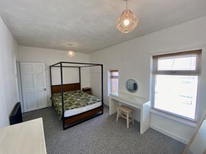 Bedroom One- click for photo gallery
